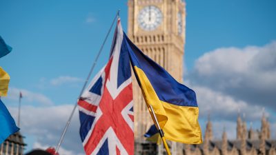 Union jack, Ukrainian flag and parliament