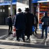 Orthodox Jewish people on a Finsbury Park street