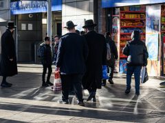 Orthodox Jewish people on a Finsbury Park street