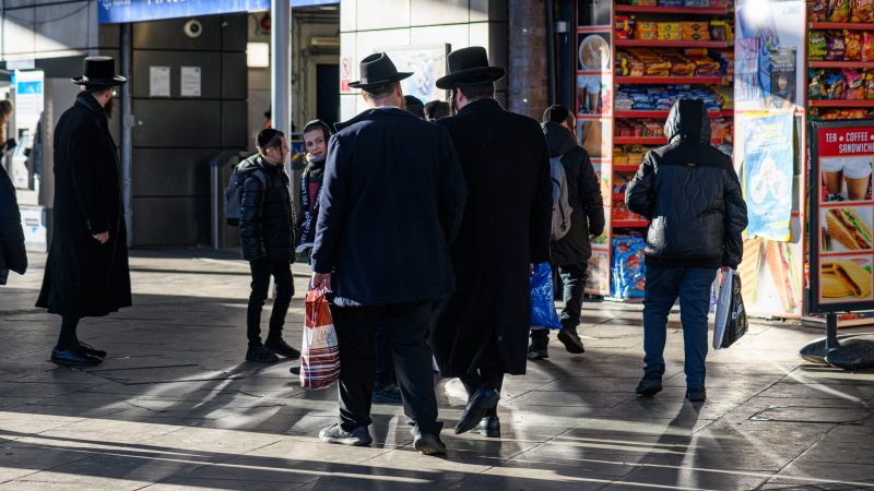Orthodox Jewish people on a Finsbury Park street