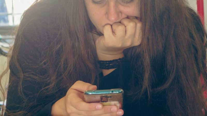 Worried Woman with phone