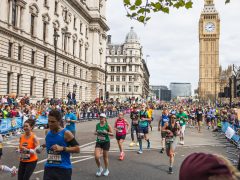 London Marathon runners pass parliament