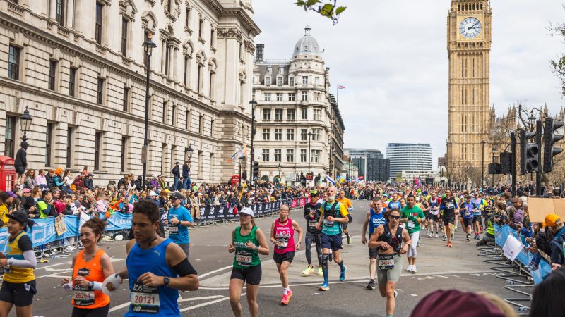 London Marathon runners pass parliament