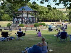 Visitors listening to the Summer concert by Nidderdale Community Orchestra in Pateley Bridge Bandstand