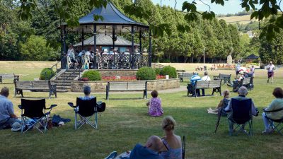 Visitors listening to the Summer concert by Nidderdale Community Orchestra in Pateley Bridge Bandstand