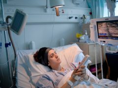 Woman in hospital bed
