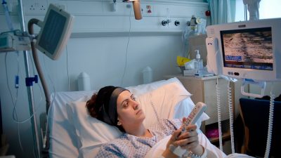 Woman in hospital bed