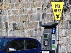 Car parking sign and machine