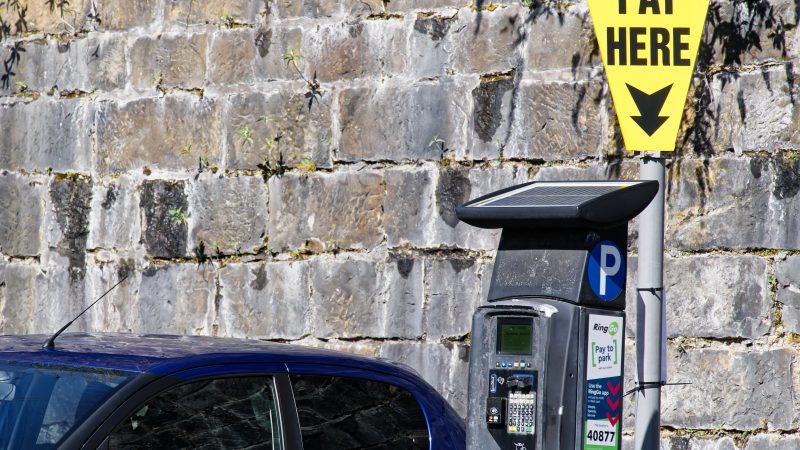 Car parking sign and machine
