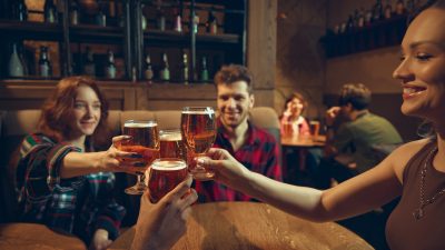 People enjoying beer in a pub.