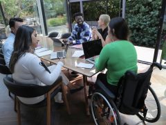 Group of workers have a conference room meeting
