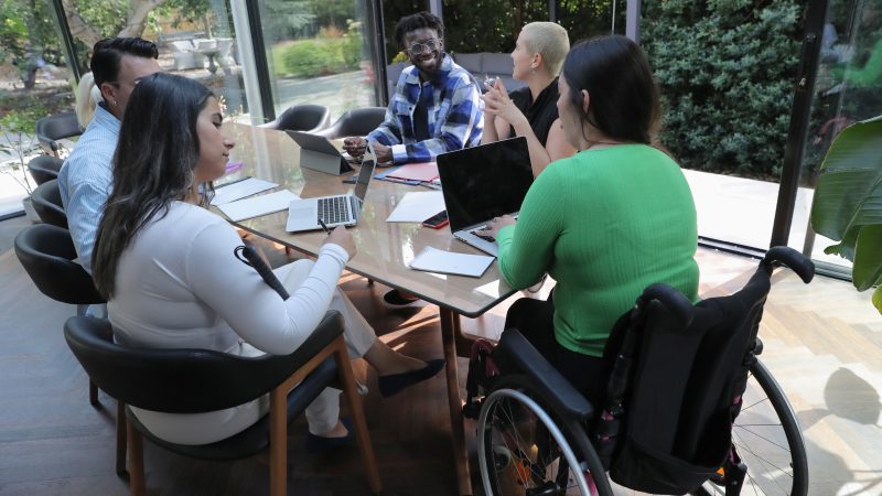 Group of workers have a conference room meeting