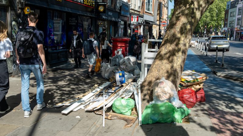 A pile of rubbish is left on the pavement of Whitechapel High Street